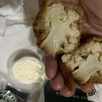 O Wow 🤩 I can’t believe how thin & crispy the outside layer batter is!   at Vegan Burger - Dubai Mall in Dubai