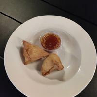 Veggie samosas with mango chili sauce at Tandoori Pizza & Wing Co - PR in Atlanta