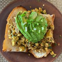 Tofu scramble with added mushrooms and avo. Unreal. at Street Three Restaurant & Bar Kratie in Krong Kracheh