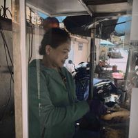 Loveliest seller at Chay Banh Mi - Food Cart in Nha Trang