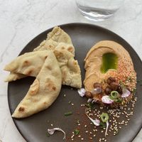 Hummus with naan 🫓   at Bistro Verde in Copenhagen