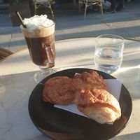 Irish coffee and a croissant at Bistro Verde in Copenhagen
