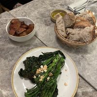 Roasted potatoes, bread and oil, and broccolini.   at Bistro Verde in Copenhagen