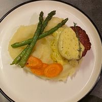 "Juicy marbles steak," with asparagus and carmelized carrots, on mashed potatoes with bearnaise. (Tasted better than this photo looks, sorry) at Bistro Verde in Copenhagen