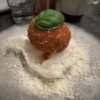 fried risotto ball on rice cracker, cheesy melt insidee  at Bistro Verde in Copenhagen