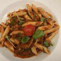 Penne mit Linsenbolognese  at CARINO Vegetarisches Restaurant & Weinbar in Hamburg