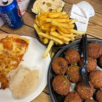 Falafel (vegan), hummus (vegan), seasoned fries (unsure), Margherita pizza (vegetarian).  at Falafel in Nottingham