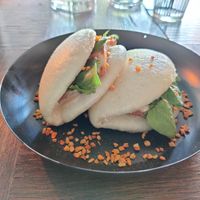 Inari bao - bao with Inari amped tofu and tom kha peanut sauce at MIRZAM COCKTAIL BAR in Gdansk