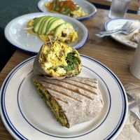 Vegan breakfast burrito. Tacos in the background.  at Clementine Bakery in Brooklyn