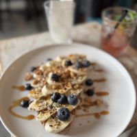 Peanut butter banana toast with blieberries  at Brandbar in Antwerpen