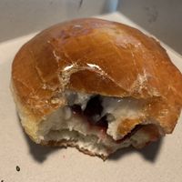 Inside the raspberry crème brûlée donut   at Doughbot Donuts in Sacramento