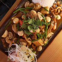 Tofu, seitan and mushroom in dark sauce with rice at Miss Vegan in Berlin