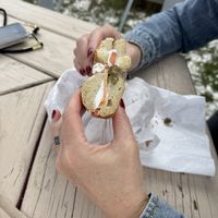 Sesame seed bagel with vegan cream cheese, tomato & capers.  at Bagel Hound in Wellfleet