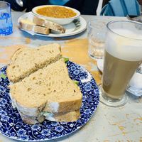 ‘Tuna Mayo’ sándwich’ oat latte 😋😋  at The Pack Horse Cafe in Bridport