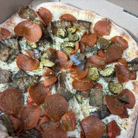 The “Vegano” pizza: 
Vegan four cheese Italian blend, mixed grilled vegetables, plant based pepperoni, EVOO at Tino's Artisan Pizza Co in Jersey City
