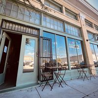 Seating outside and in the back.   at Elevation Coffee in Tampa