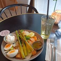 Seasonal asparagus salad with passion fruit Italian soda. at Bakery Miriam  in Jyvaeskylae