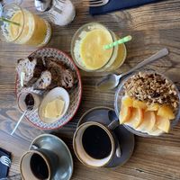 Granola with peach, orange & banana. Pain sportif (bread with fruit & pistachio) with fig jam.  at La Petite Cantine in Le Lavandou