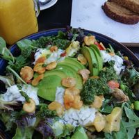 They were out of hummus,  which goes on a salad.  But a waitress spotted it and came outside at high pace to correct it at Blend in Bolsward