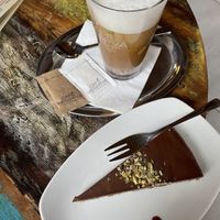 Latte with almond milk and pistachio cake  at Kavarna U Stefanika in Cesky Tesin