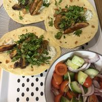 Mushroom gyros with cucumber raita, Greek salad and oregano fries  at Grubby in East London