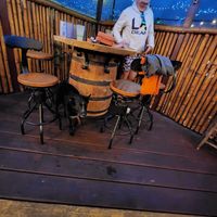 dog friendly seating outside, undercover so fine if it's raining at Big Island Brewhaus in Waimea