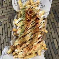 Pulled jackfruit spicy loaded fries with a  at Tito Alkmaar in Alkmaar