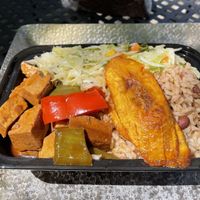 Stew chicken with rice and beans and cabbage. Delicious and filling   at Natural Blend in Brooklyn