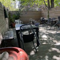 Peaceful outdoor seating in back  at Natural Blend in Brooklyn