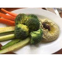 Green Hummus is their organic chickpea dip with fire roasted poblanos served with crispy flour tortilla chips or veggies. Wonderful! at Green New American Vegetarian in Phoenix