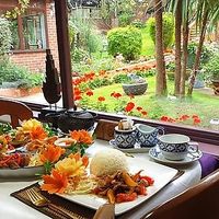 Dining area has a lovely view of the restaurant garden at Siam Garden in Grantham