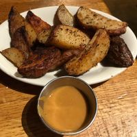 Oven fries with peanut sauce at People's Pint in Greenfield