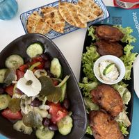 Tomato balls , Greek salad  at Mama Meze in Santorini