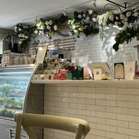 inside counter. Not pictured to right was beverage cooler. Wall opposite counter was artisan/locally made pantry groceries.   at Garden Carver in Brooklyn
