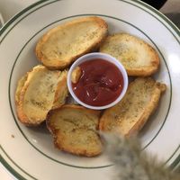 Potato skins with ketchup   at Garden Carver in Brooklyn