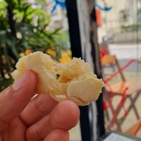a textura do pão de queijo at Matuta Queijaria Vegana in Sao Paulo