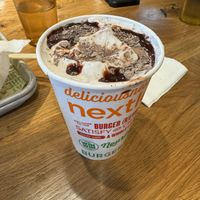 Mint chocolate chip milkshake with coconut milk and soy milk   at Next Level Veggie Grill in Denver