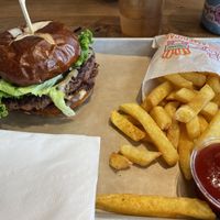 burger and fries  at Next Level Veggie Grill in Denver