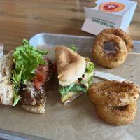 Bacon burger & fire chicken sandwich (chicken was great) onion rings  at Next Level Veggie Grill in Denver