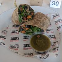 Vegan burrito sub kale for fresh arugula. Salsa very spicy 🥵 at Ingo's Tasty Food in Phoenix