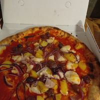 Rice mozzarella olives, onion and more at Nevodi PizzaLab in Venice