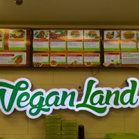 The inside.  Shame the name isn't completely accurate.  Check the allergen list on the bottom right and compare against the listed items for what you intend to order. at Veganland - Weidengasse in Cologne