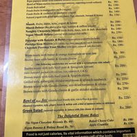 Breakfast menu (Dec 2022)- also a page of drinks on the back   at Honey and Spice in Pushkar