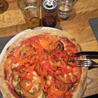 Pizza with vegan cheese at Etna in Divaca