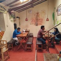 Comiendo en El Encuentro  at El Encuentro - Tigre in Cusco