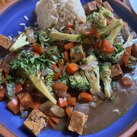 Fried veggies and tofu with rice  at El Encuentro - Tigre in Cusco