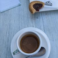 Vegan crostatina al lampone (vegan sweet pie with raspberry jam) and coffee at Pasticceria Caffetteria Centeleghe in Farra Dalpago