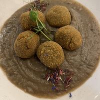 Polpette di fave e ceci su crema di melanzane.  at I Morgante Bottegabistro in Agrigento