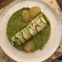 Cannolo di zucchine ripiene di purè di patate su letto di crema di piselli.  at I Morgante Bottegabistro in Agrigento