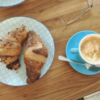 Vegan chocolate croissant, blueberry croissant and oat cappuccino at Coffee Junkie in Vienna